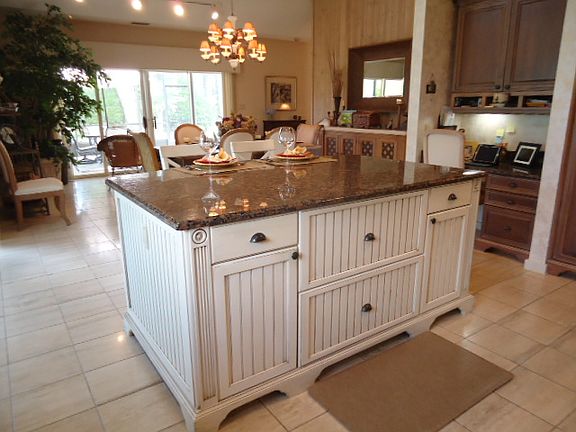 Kitchen looks toward outside