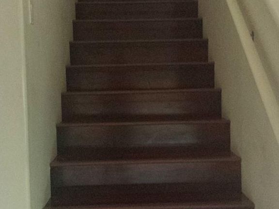 laminate wood flooring on stairs, hallway and master bedroom