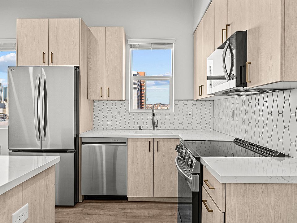 Experience the elegance of a contemporary kitchen, merging style with function.