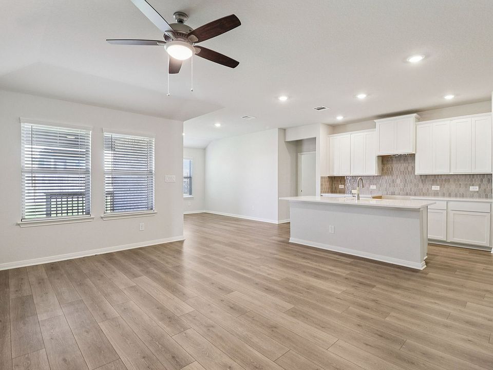 Living room in the Callaghan floorplan at a Meritage Homes community.