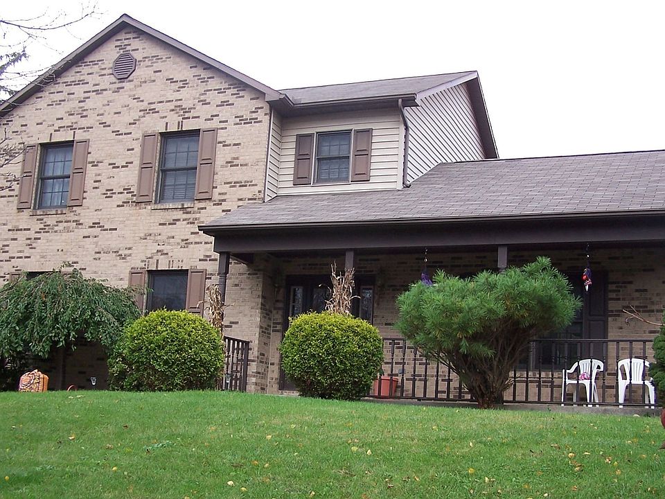BEAUTIFUL 2 STORY BRICK AND FRAME HOME WONDERFULLY LANDSCAPED.