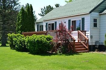 The home has a front deck to welcome visitors.  The landscaping is already in and ready for you to enjoy.