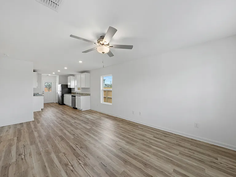 The main areas include vinyl flooring.