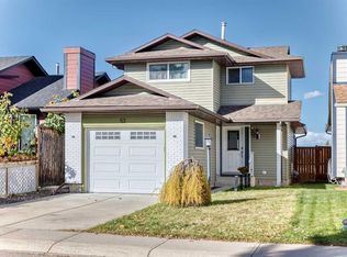 52 S Cedargrove Rd SW, Calgary, AB T2W 4T9
