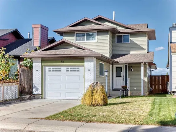52 S Cedargrove Rd SW, Calgary, AB T2W 4T9