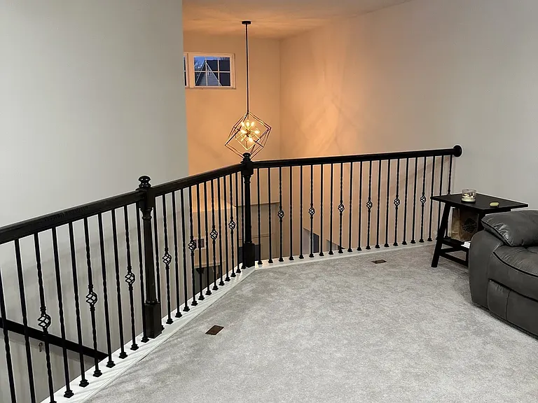 Spacious loft area at the top of the stairs