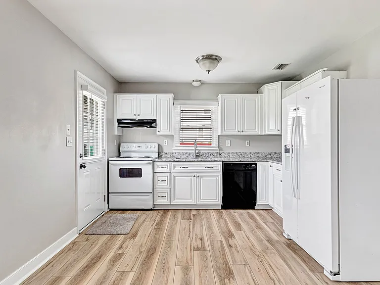 New granite countertops (2026) and painted cabinets