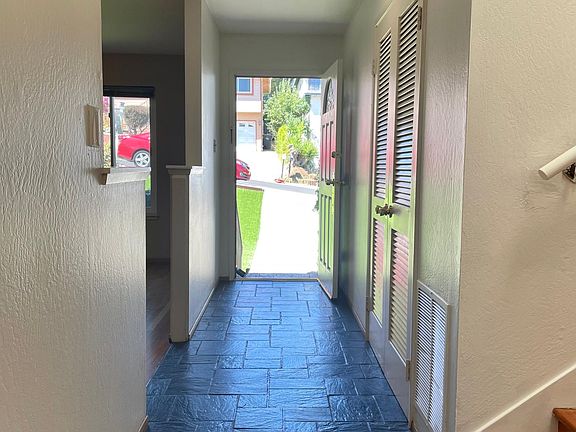Entry hallway, facing outside