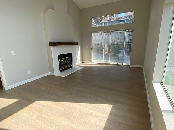 Living room with access to backyard patio