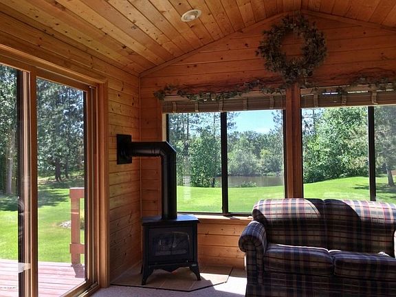 Four Season Porch with Gas Fireplace.