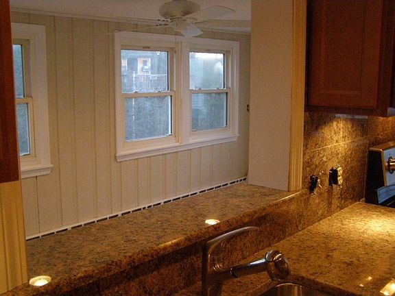 Kitchen into heated enclosed back porch