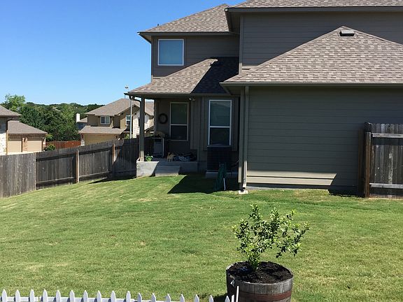 View of backyard and house