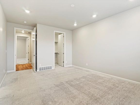 A view of the master bedroom and bathroom
