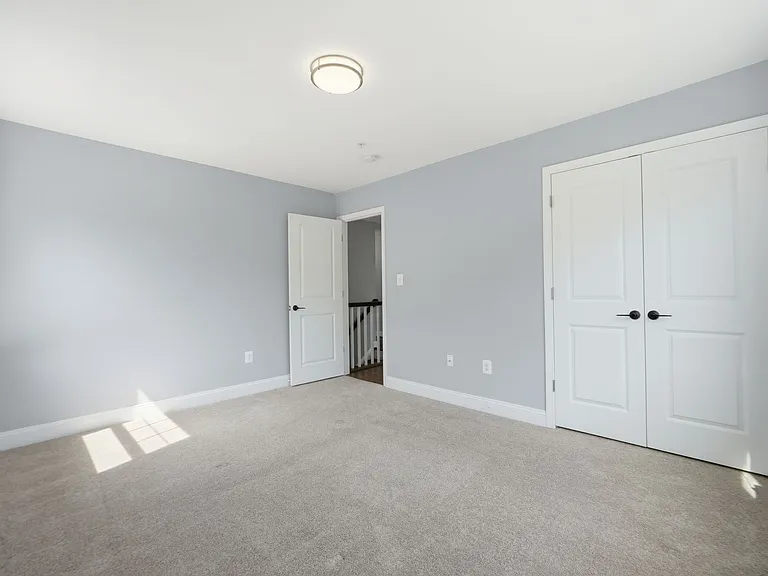 One of three large upstairs bedrooms with closet (in addition to upstairs master).