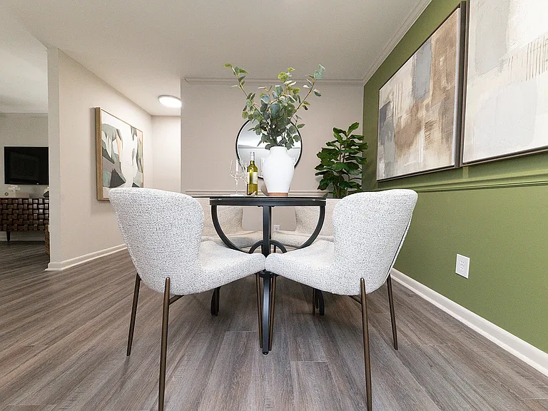 Dining area with hardwood-style flooring