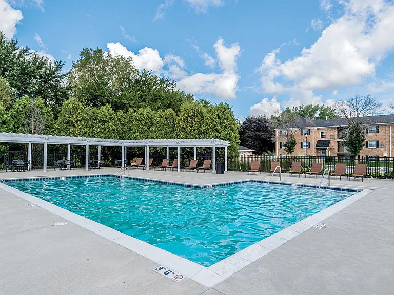 Resort-style pool for sunbathing and recreation