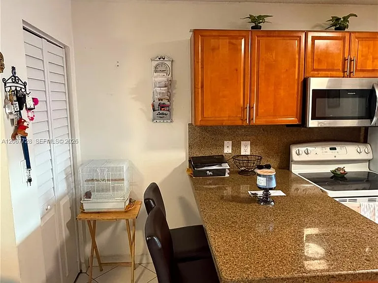 7881 SW 152nd Ave #1203 — Photo 1