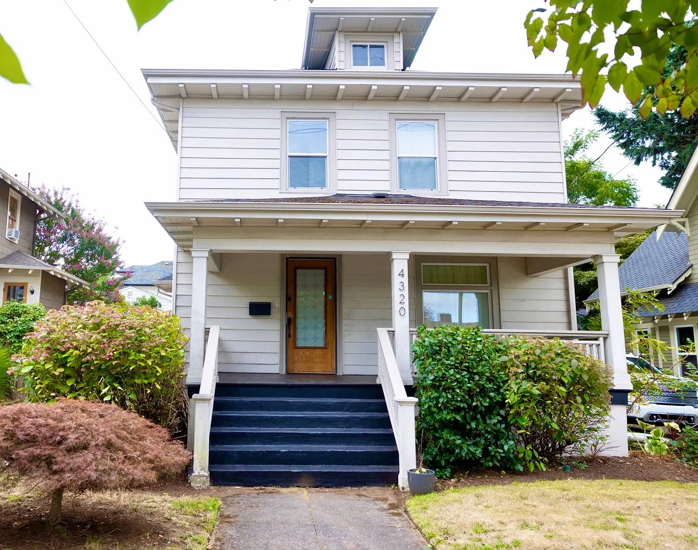 Classic American Foursquare with Character, Updates, and 5 Bedrooms in Woodstock — Photo 1