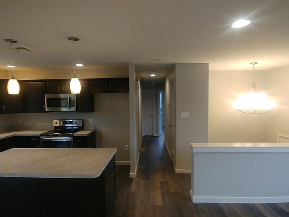 Hallway to upstairs full bath and bedrooms