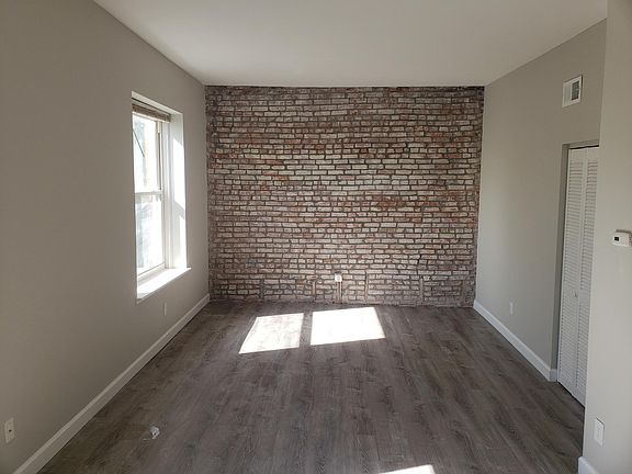 Beautiful exposed brick in living room