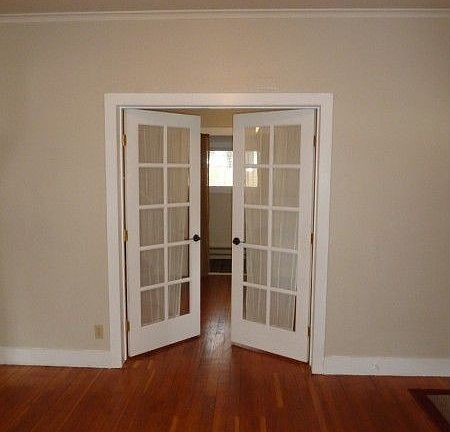 Current sellers used the room behind the french doors as their bedroom. It could also be used as a f