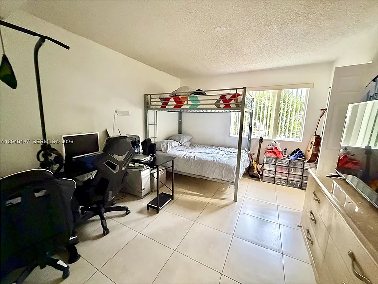 10521 SW 158th Ct #203 — Photo 11