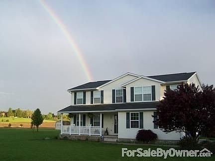 Front
						:
						This large home is in a picturesque setting.