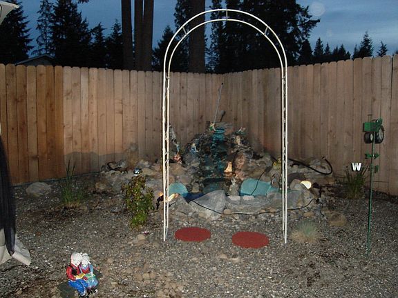 night view of waterfall/pond