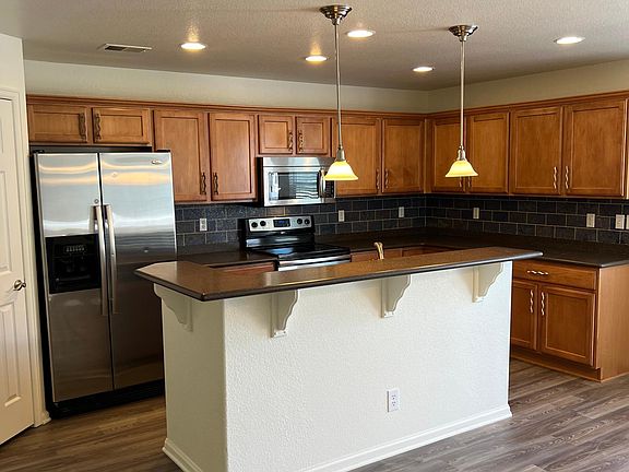 3rd image of 19023 E 58th Ave