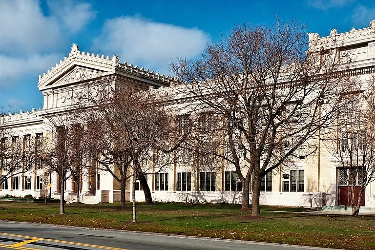 The high school across the boulevard is an architectural landmark built over a century ago.