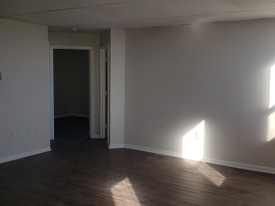Looking at the two bed rooms from the side of the kitchen and main room.