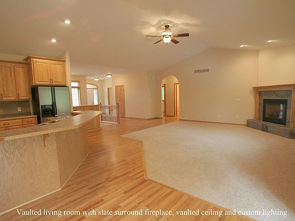 Warm familyroom with vaulted ceiling.