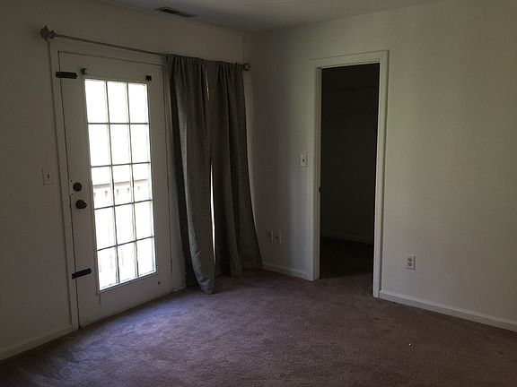 Bedroom with deck and walk in closet