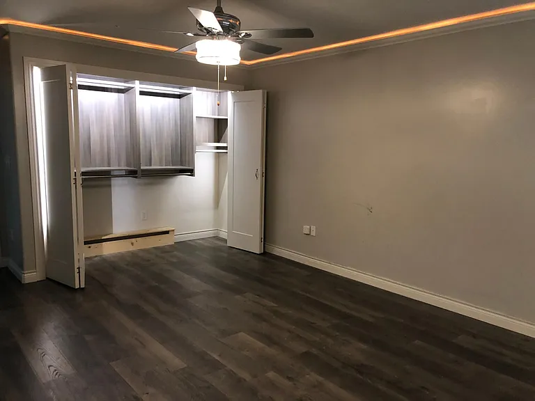 Master closet with plenty of hanging space.