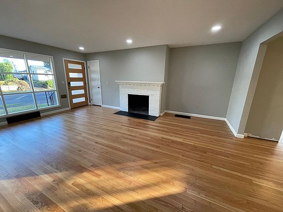 Wood burning fireplace upstairs LR