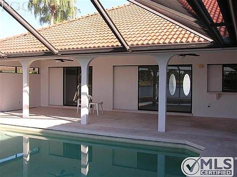 Large lanai and pass thru window to kitchen. Pocket sliders to the master bedroom, living room, dini