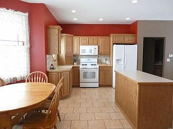 Kitchen includes an island for additional space