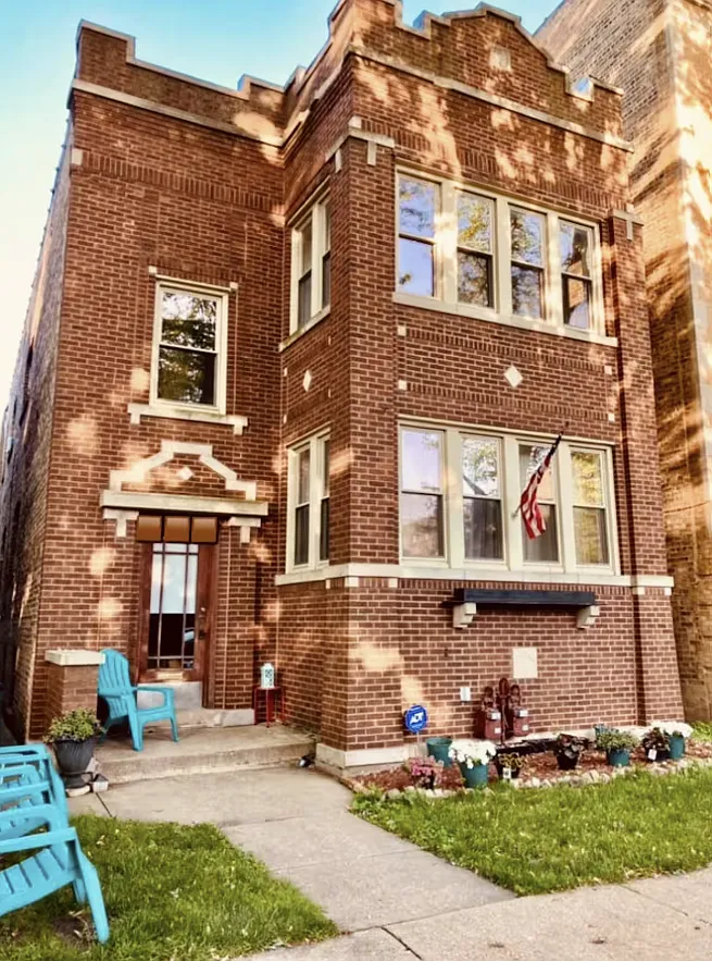Building Photo - 7335 N Honore St #1