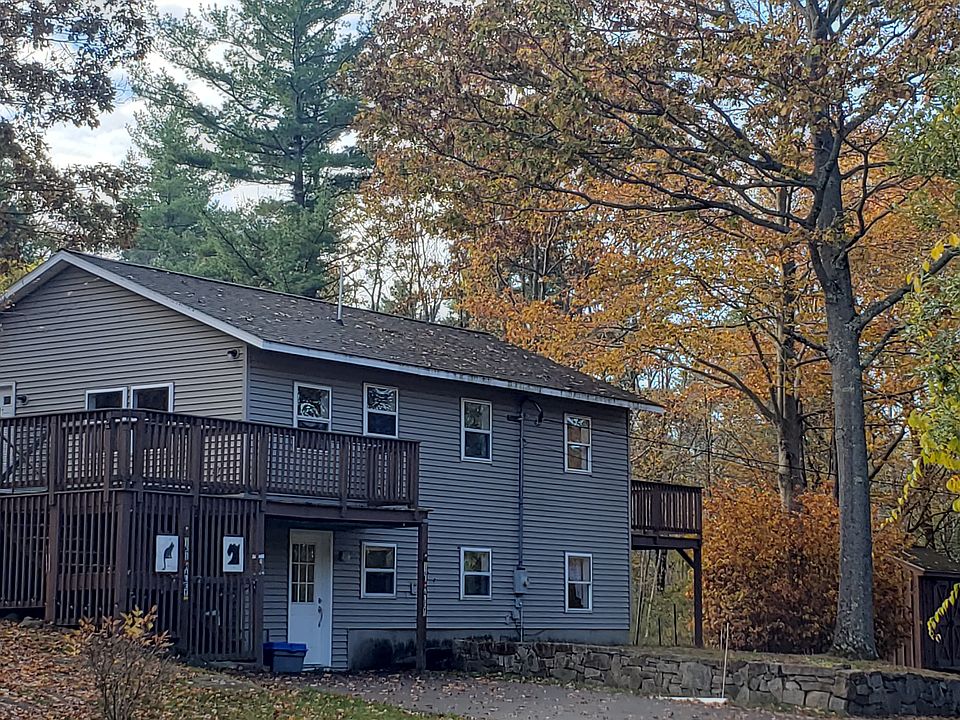 Outside of home with front deck.