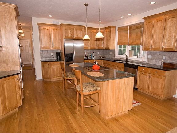 High End Kitchen with Granite & Hardwood
