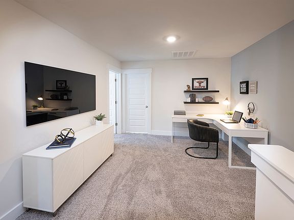 The upstairs loft gives the kids a place to hang out. Photography from Douglas Townes.