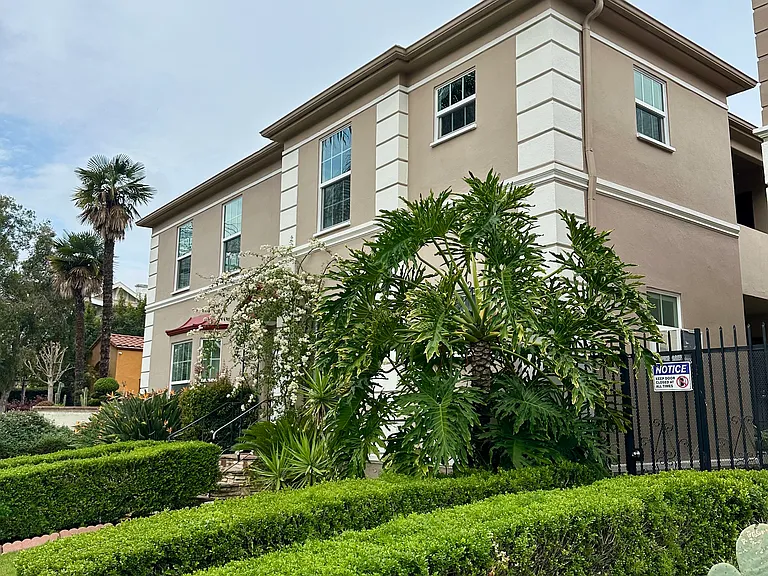 Secure gates throughout the property, gorgeous landscaping and nicely painted exteriors