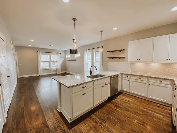 Kitchen, looking into dining and living room