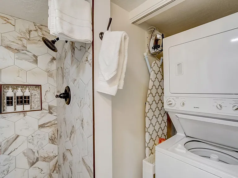 Washer and dryer in primary bedroom