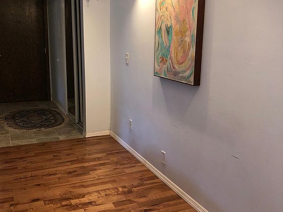 Main entryway with wood floors.