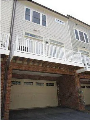 Rear View - Deck with 2 car garage and 2 car driveway - 354 Community Center Ave