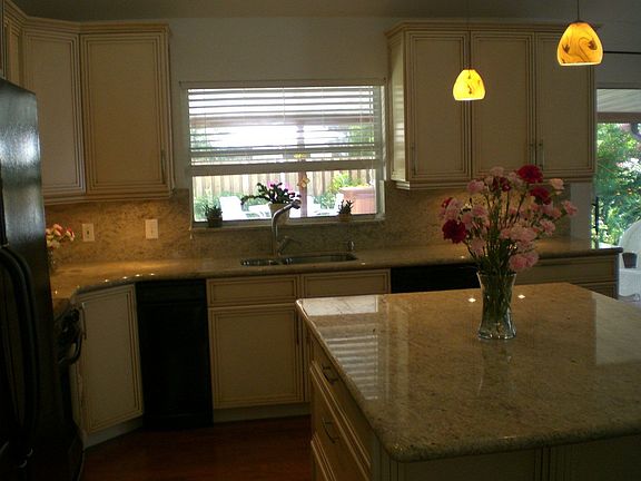 Kitchen - all granite, wood flooring