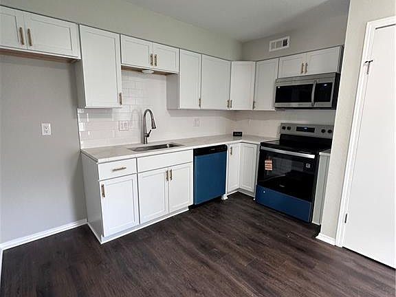 5th image of 8113 & 8115 E 100th Terrace Ct