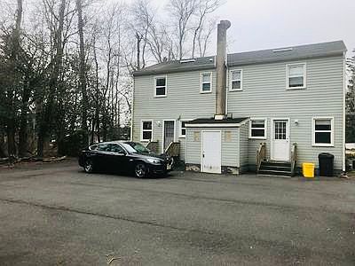 Back of the building with ample parking