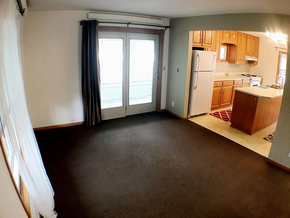 Large living room adjacent to kitchen